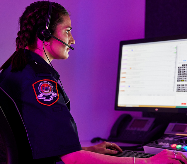 Photo of an Emergency Communications officer